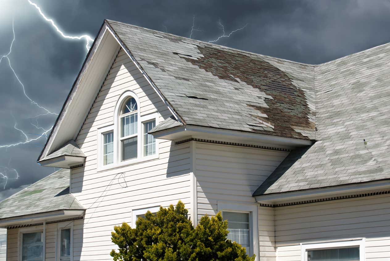 roof with damage during a storm