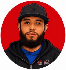 Cartoon portrait of a man with a beard wearing a black cap and hoodie against a red circular background, blue shirt visible at the neck.